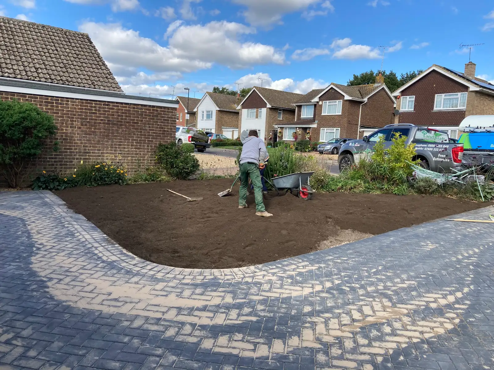 The Landcraft team setting block edging for a new driveway