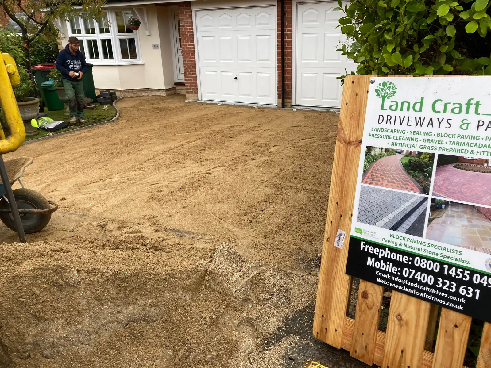Sand base prepared for a new driveway