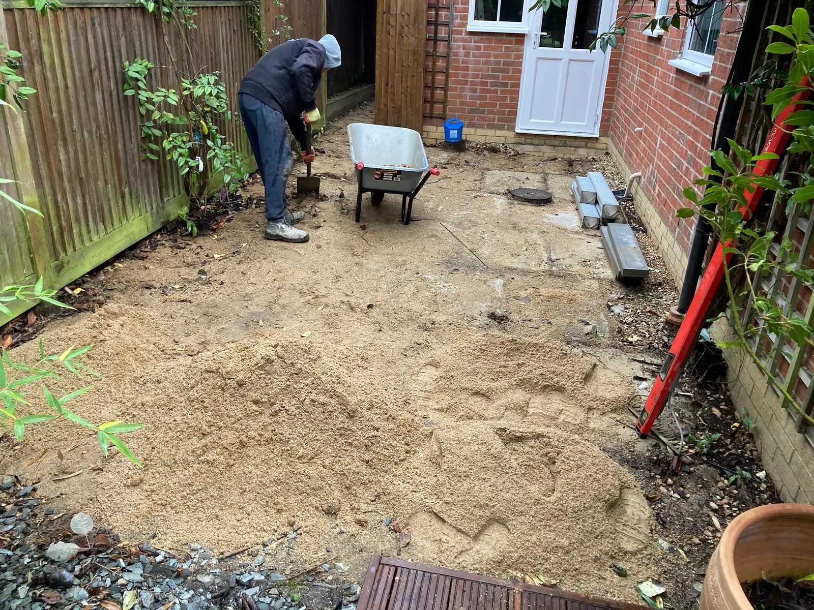 Digging out a garden for new paving