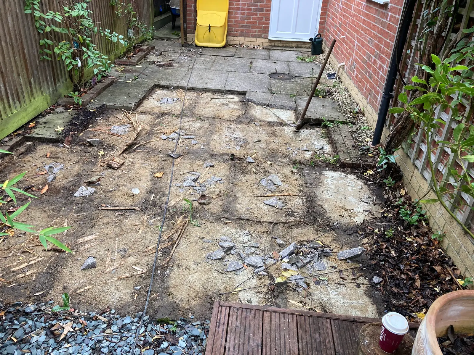 Old patio lifted ready for new paving