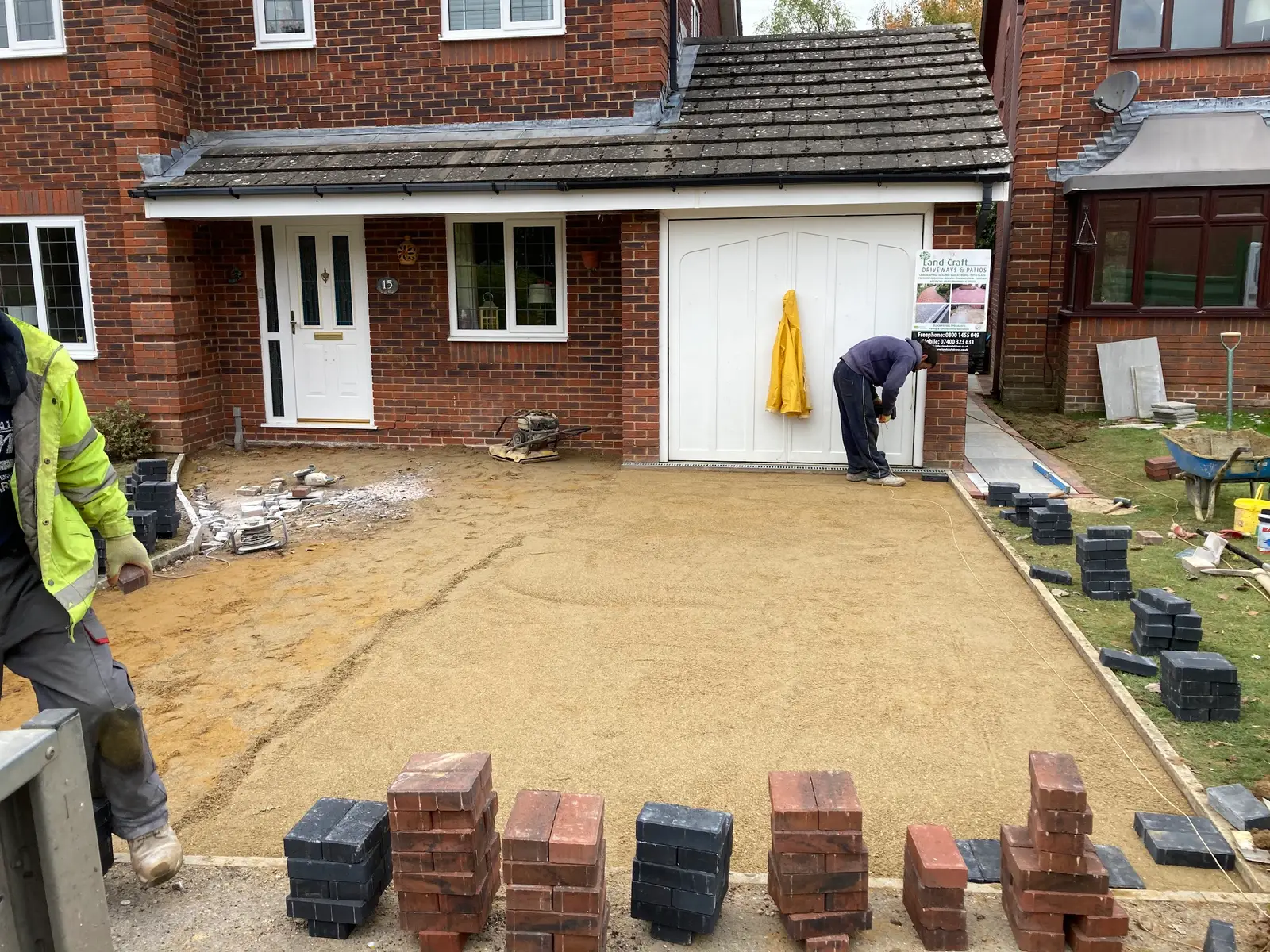 Blocks stacked ready to lay on a screeded sand base