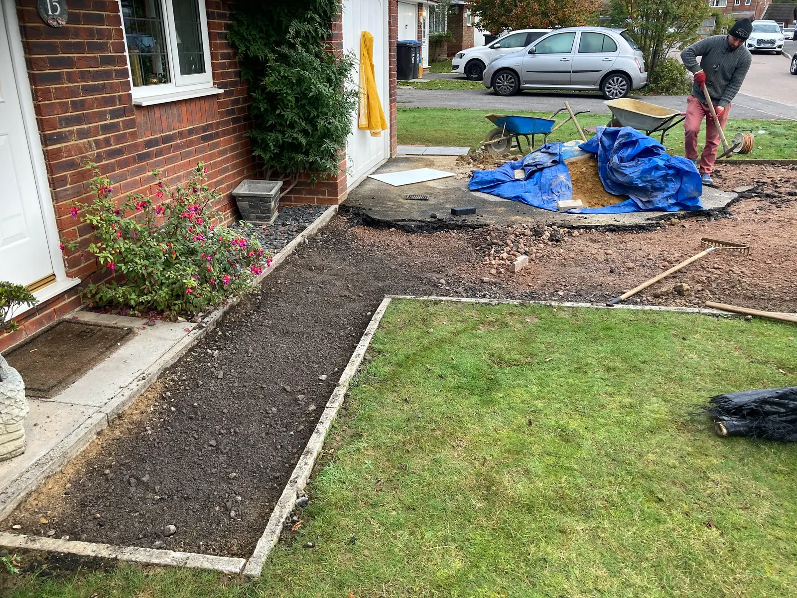 New path dug out and edged beside a lawn